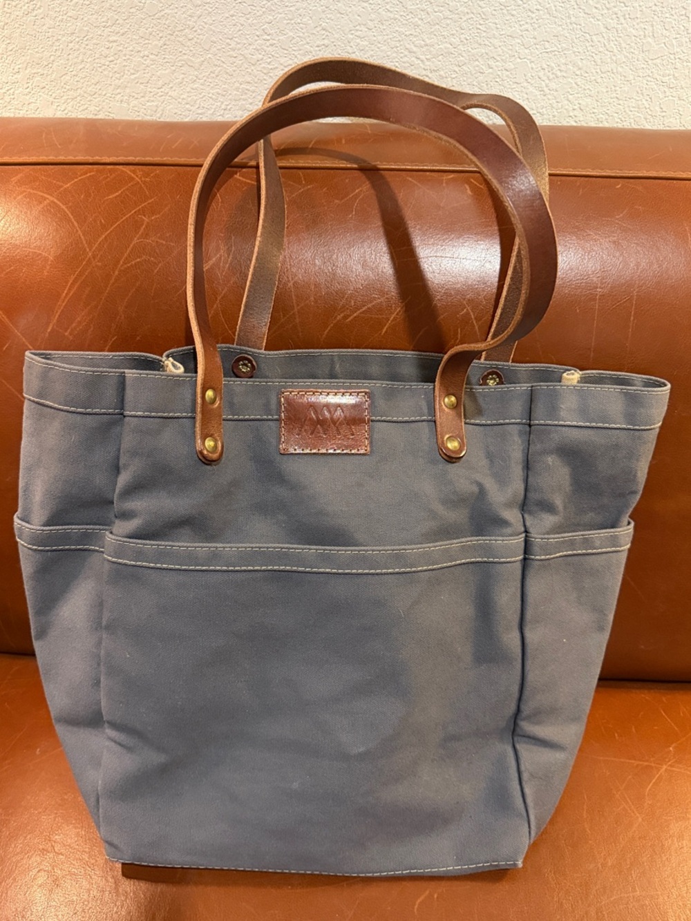 Artifact Waxed Canvas Messenger Tote in Slate Blue with Brown Leather Handles